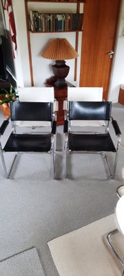Spisebordsstol, Frisvingerstole med armlæn.
2 sorte i lækker kernelæder
2 hvide i wanna be læder

Læ