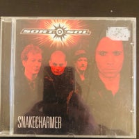 Sort sol : Snakecharmer (CD), rock