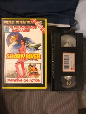 Anden genre, Shark river, Udlejningskassette. 1984. Danske undertekster. Er ikke udgivet på DVD med 