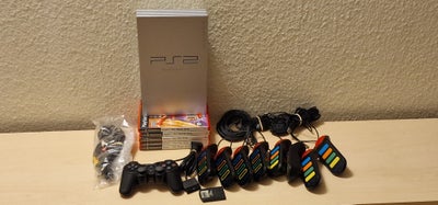 Playstation 2, Buzz Pakke Silver PS2 PHAT Konsol med tilbehør sælges..

sælges for 750 kr som samlet