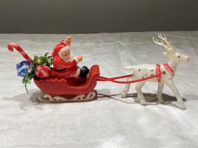 Daells varehus julemand i kane, Retro rensdyr med julemand i kane.
I plast.

Fra 70erne.

Længde ca 