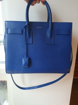 Håndtaske, Yves Saint Laurent, Smukkeste helt blå sac du jour fra Saint Laurent.

Den har brugsspor.