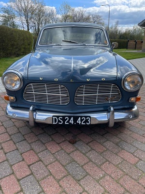 Volvo 121, Benzin, 1964, km 85000, blåmetal, 2-dørs, Holder syn til 2028 

Fin veteranbil. 


Den sa