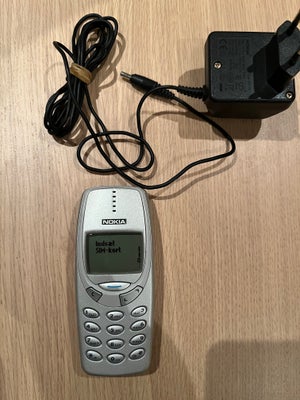 Nokia 3310, God, Nokia 3310 med oplader.