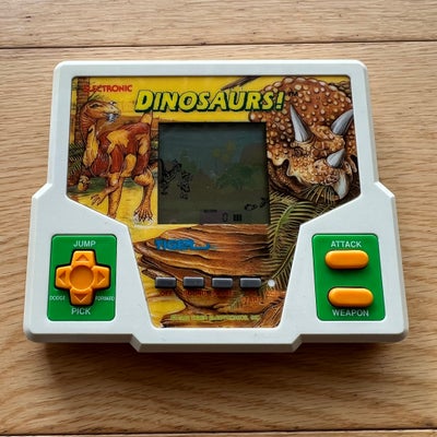 Tiger Electronics, andet, Perfekt, Bip bip spil fra 80’erne
Dinosaurs! Fra Tiger Electronics 1988
Te