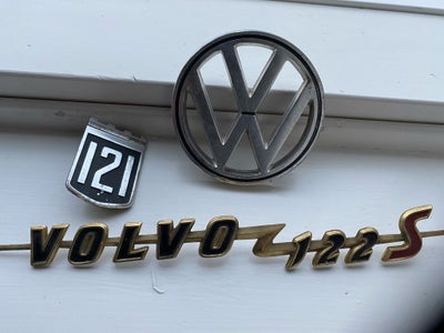 Emblemer, Volvo  VW, Volvo 122S - gammelt org emblem har 2 ud af 3 pinde til montering : 150kr
Volvo