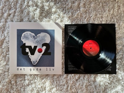 LP, TV-2, Det Gode Liv, Rock, TV-2s album Det Gode Liv fra 2015 i udsøgt stand. LP/Cover EX/EX. 

Ka