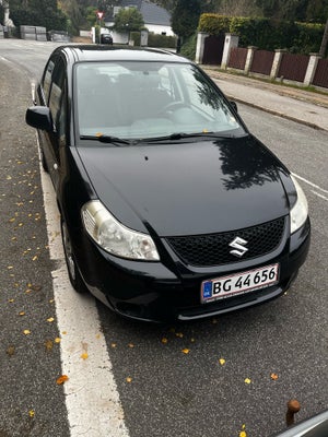 Suzuki SX4, 1,6 GL-J, Benzin, 2010, km 217000, sortmetal, træk, nysynet, aircondition, ABS, airbag, 