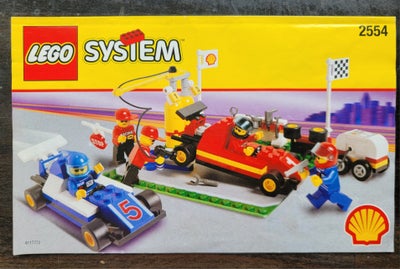 Lego City, 2554, Lego 2554 Formula 1 Pit Stop fra 1998. 

Komplet med sort værktøj. I flot stand. Pæ