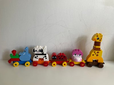 Lego Duplo, Tog med dyresamlesæt: elefant, hund, mariehøne og giraf. Klodserne kan samles til rigtig