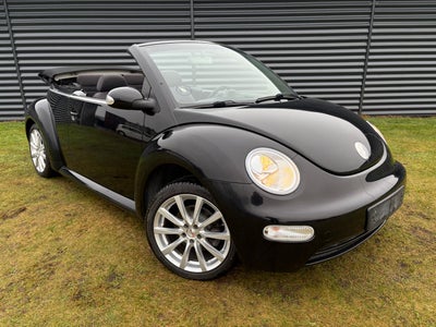 VW New Beetle, 1,4 Cabriolet, Benzin, aut. 2003, km 230000, sortmetal, ABS, 2-dørs, centrallås, star