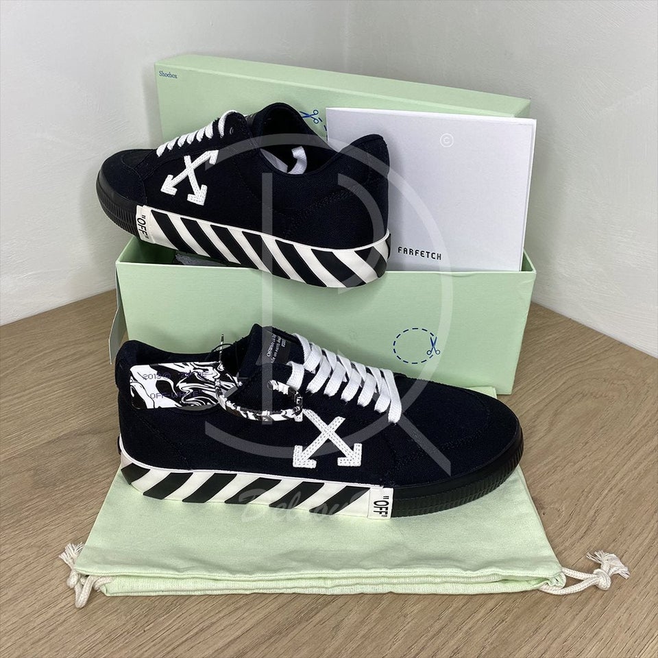 OFF-WHITE logo-patch low-top Vulcanized Sneakers...