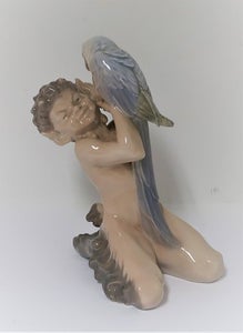 Royal Copenhagen. Porcelænsfigur. Faun med papegøje. Model 7