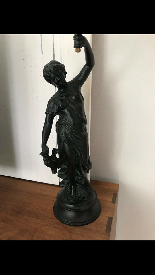 Art deco figur med ur