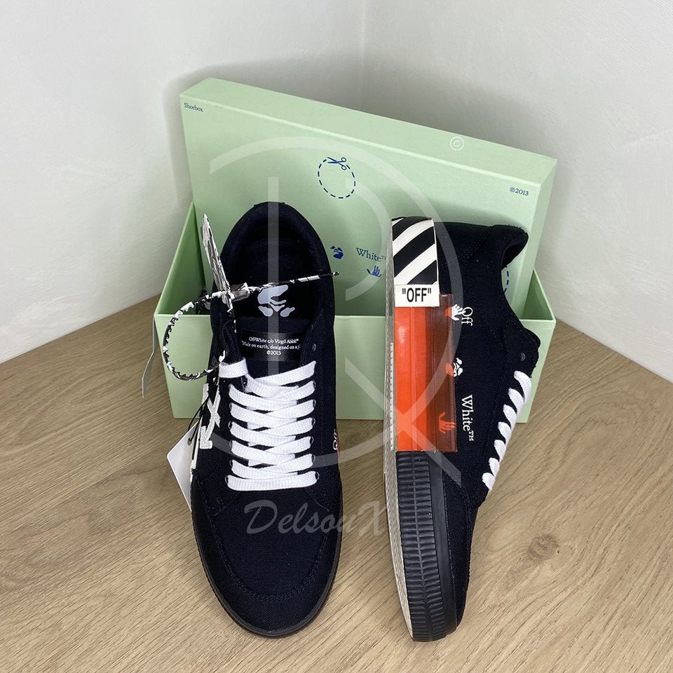 OFF-WHITE logo-patch low-top Vulcanized Sneakers...