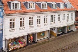 Udlejningsejendom i Køge til investering på indkøbsgaden